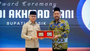 Bupati Yani Raih Penghargaan berkat Model Perlindungan Anak PMI